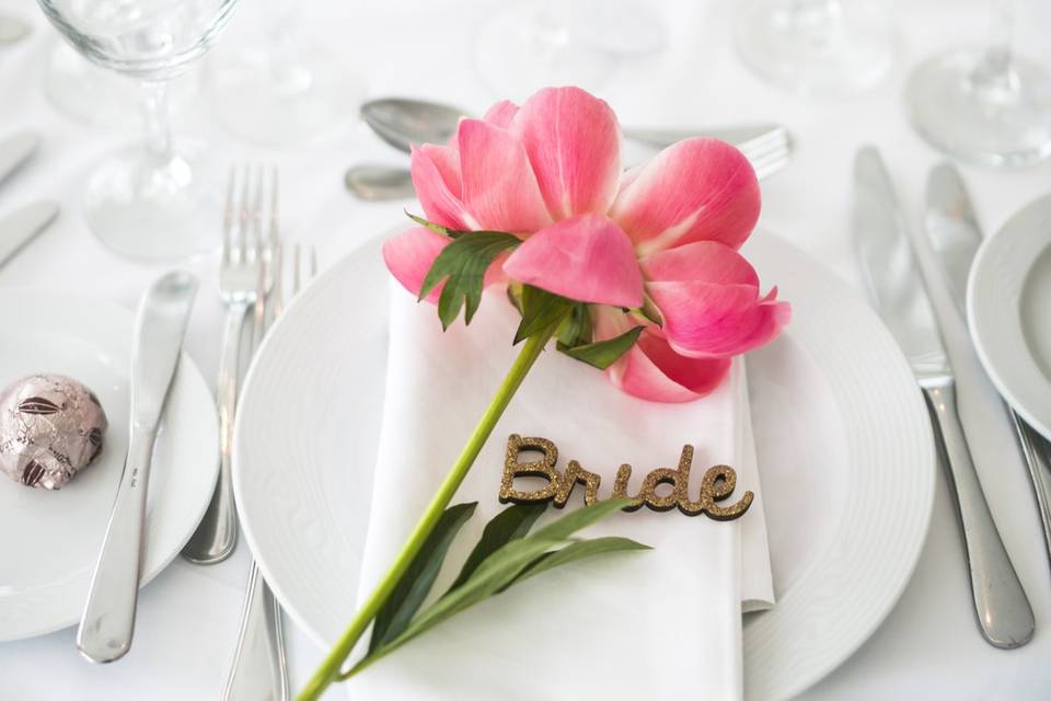 Table setting and flower