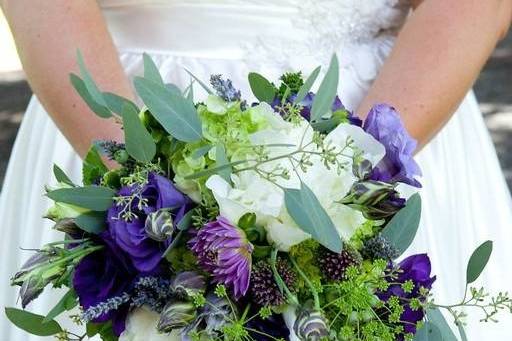 McMenamins Grand Lodge wedding featuring purples whites and greens. Photo courtesy of Lydia Daniller