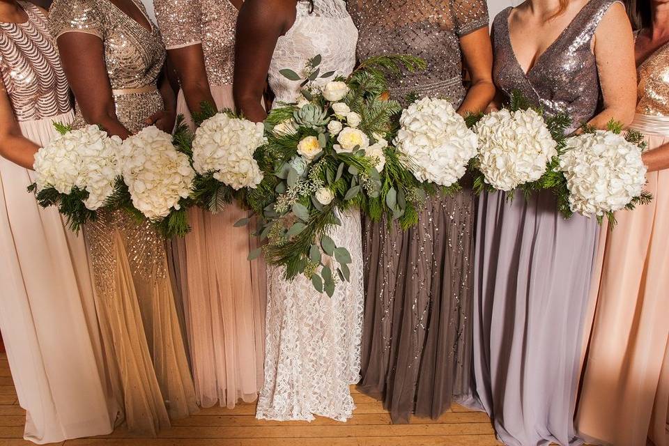 Portland, Oregon New Years Eve Wedding at The Village Ballroom. Organic bridal bouquet and white hydrangea bridesmaids bouquets.