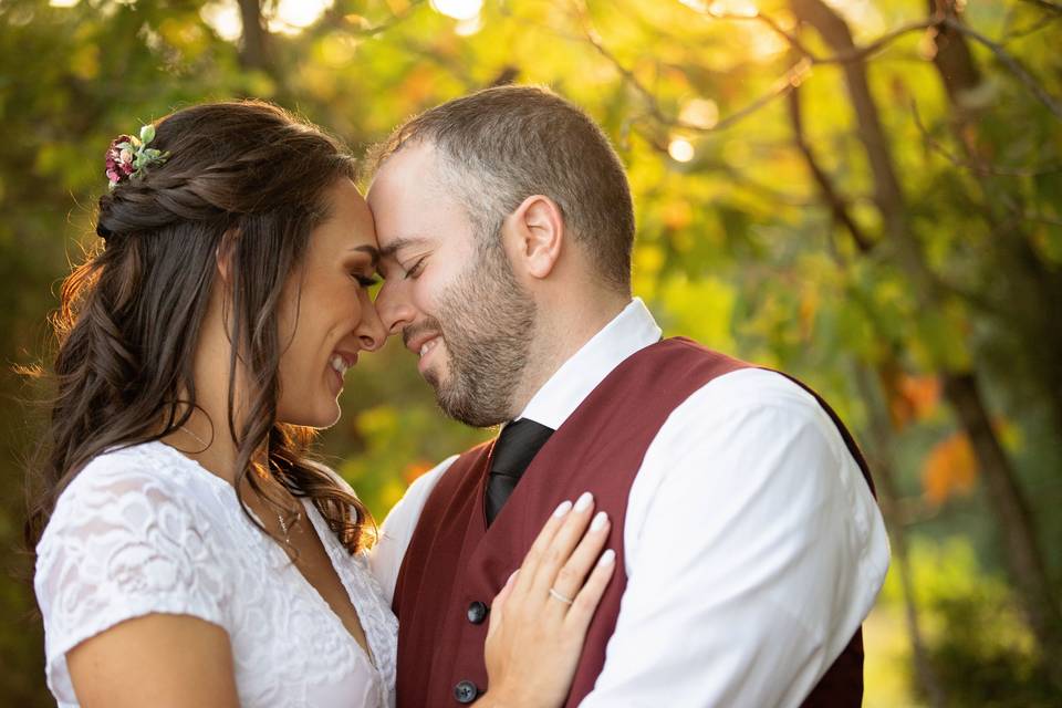 Bride and groom snuggling