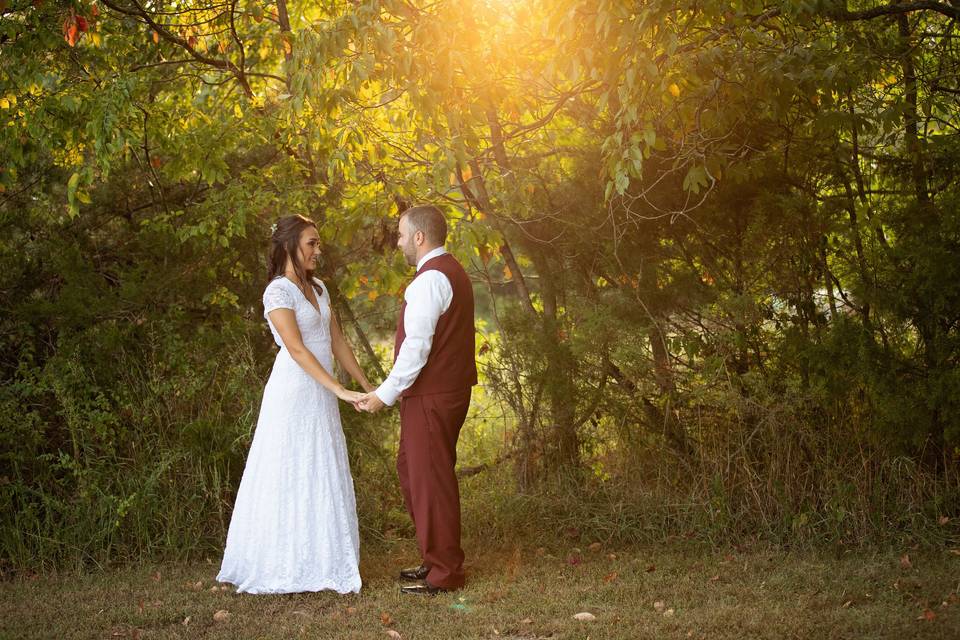 Bride and groom holding hands