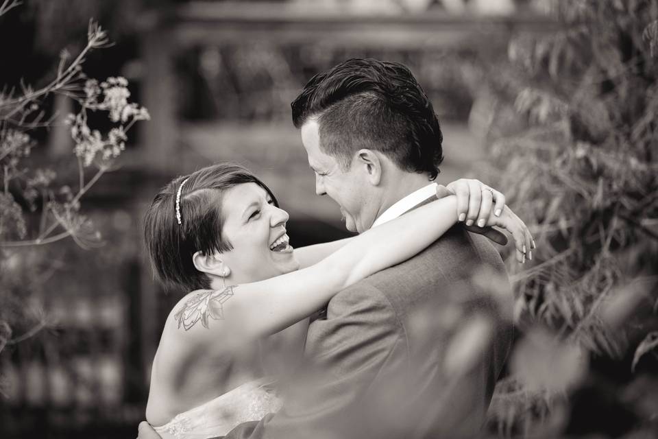 Bride and groom laughing