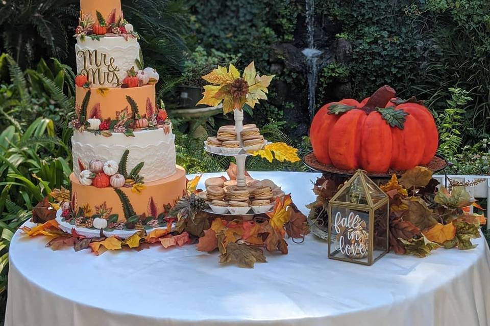 Pumpkin wedding & grooms cakes