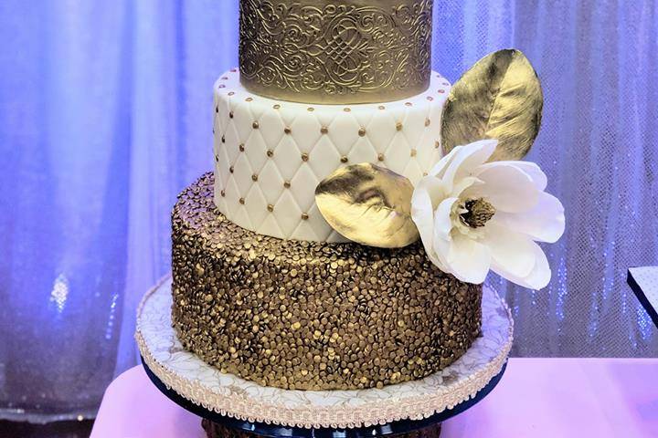 Gold and white wedding cake