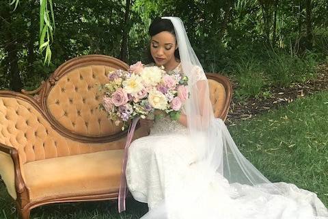 Royalty Hair Salon - bride relaxing on chaise