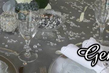 Clear diamond confetti on silver tablecloth