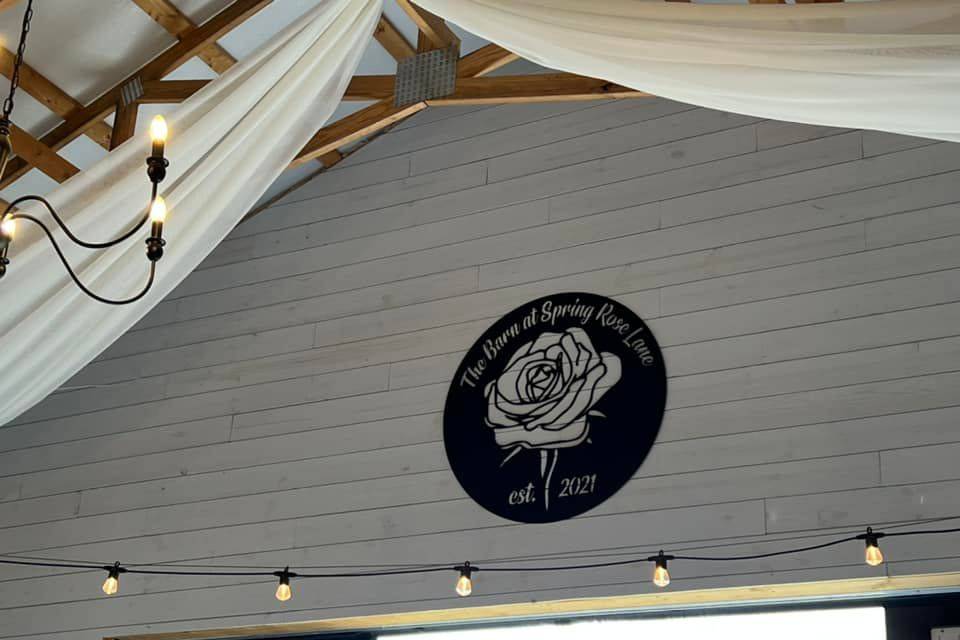 Sign above doors in barn