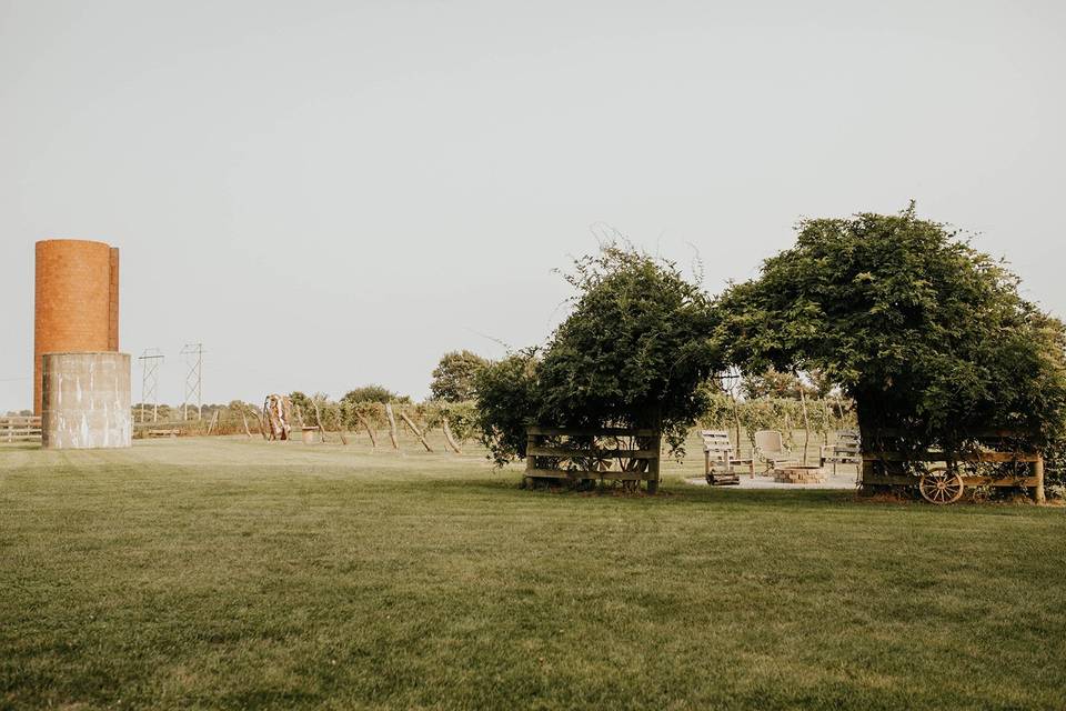 Wisteria arbor, vineyard, silo