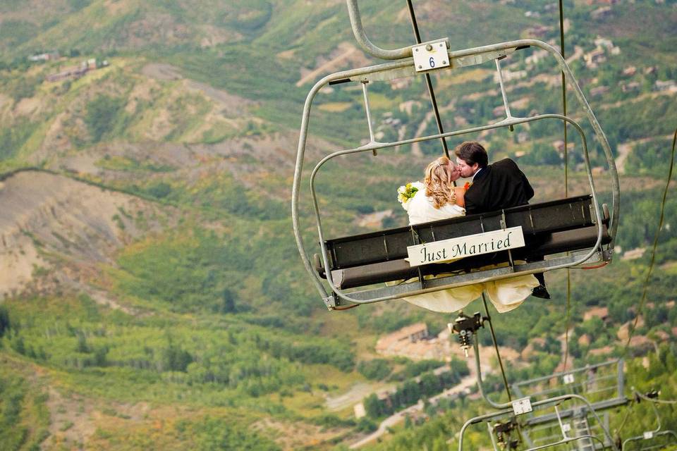 Chairlift wedding kiss.