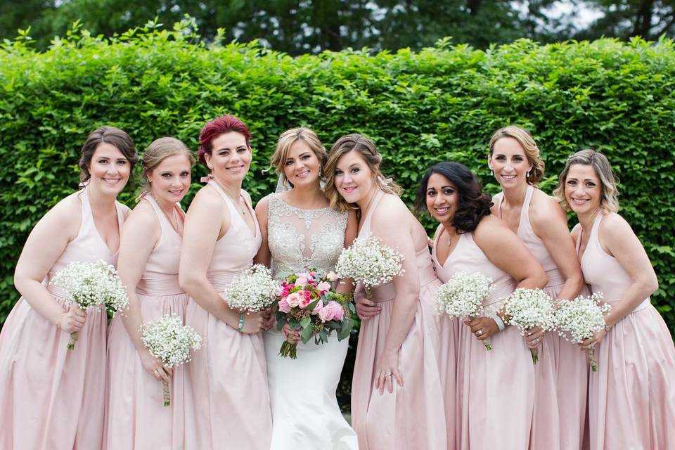 Joyful bride and bridesmaids