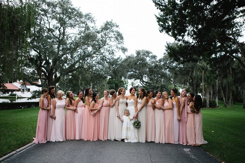 The bride with her bridesmaids and flower girl