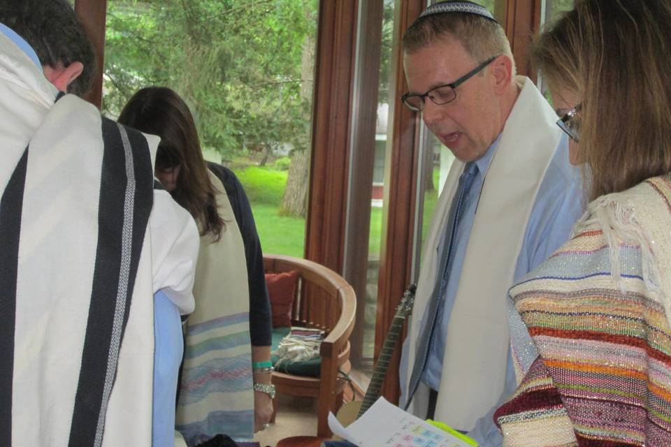 Officiant looking through the items