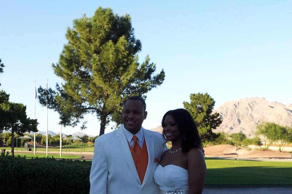 The couple wearing white