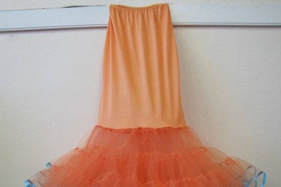 Mermaid Tulle Bridal Slip
http://www.etsy.com/listing/58472115/cupcake-dream-tutu-crinoline?ref=v1_other_1