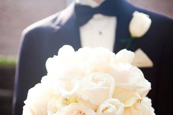 Groom holding bouquet