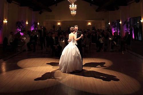 Natural light first dance of the bride and groom in the ballroom of The Pinery in Black Forest, Colorado