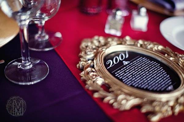 The couple had been together quite sometime, before tying the knot. We created these unique table numbers, each year describing a story unique to that time period.