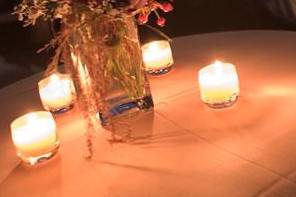 Candle lights and floral centerpiece