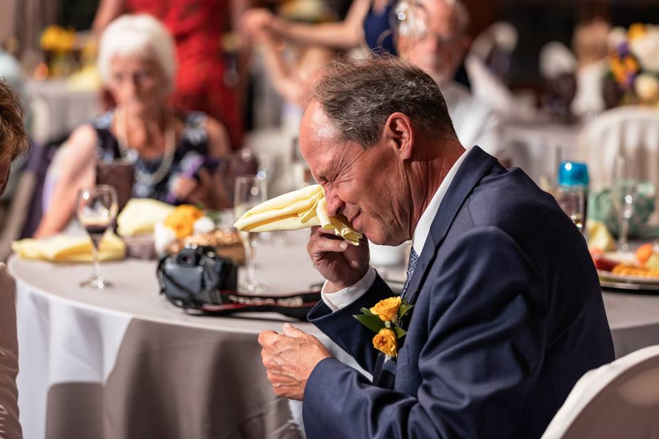 Dad crying at reception