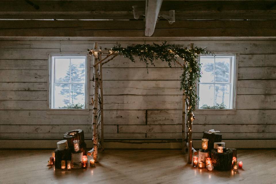Candlelit wedding arch