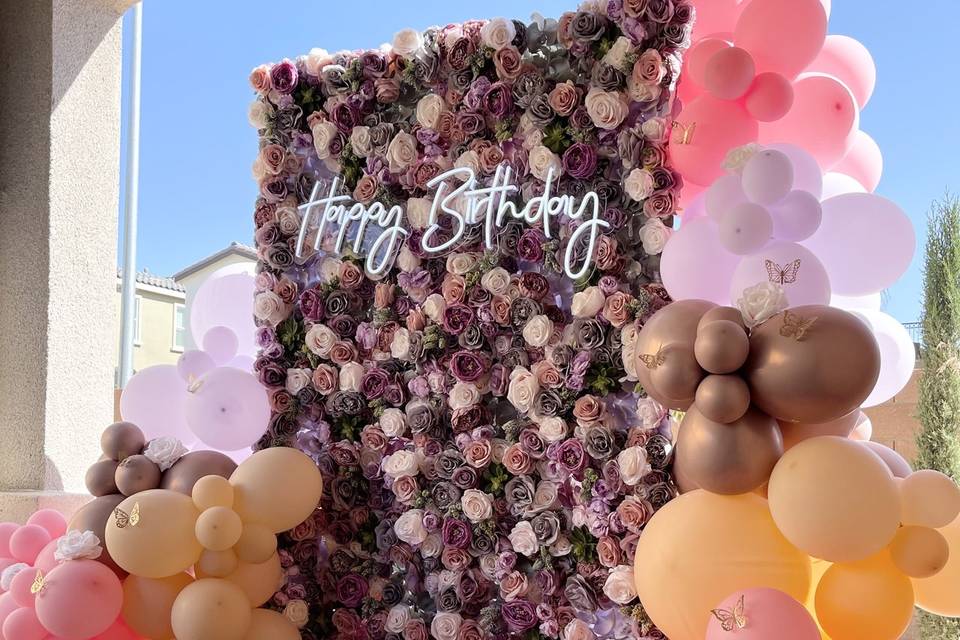 Flower wall and balloon decor