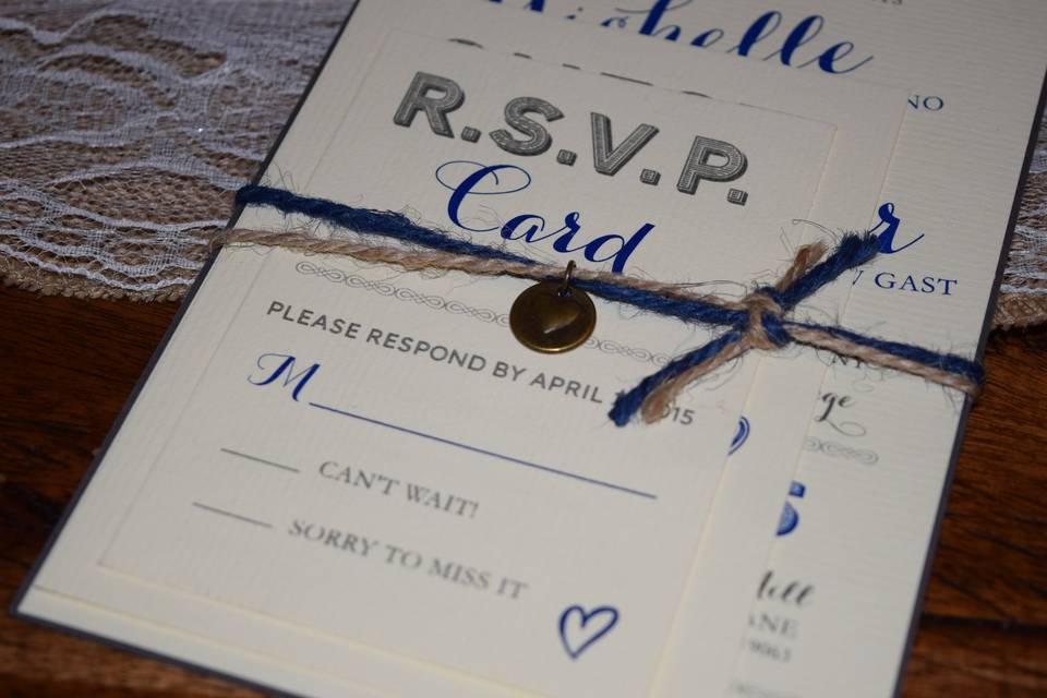 invitation and RSVP card displayed together for a rustic event