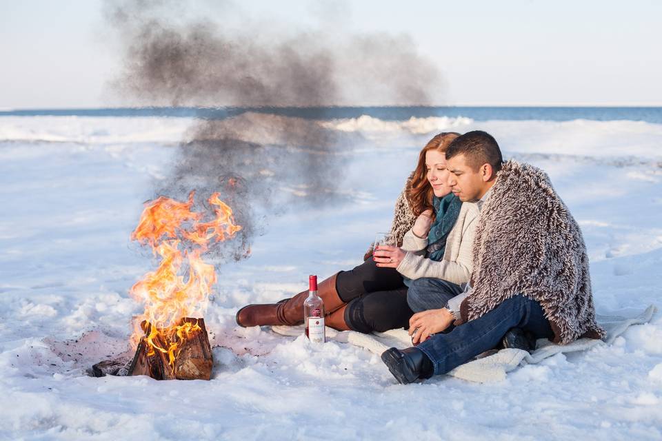 Winter Engagement Session at Light House Beach in Fort Gratiot, MI. A bonfire and some wine…SO perfect