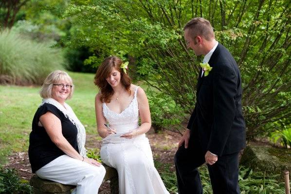 Officiant and the couple chatting
