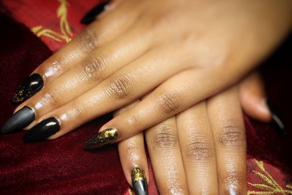 Long black nails with gold