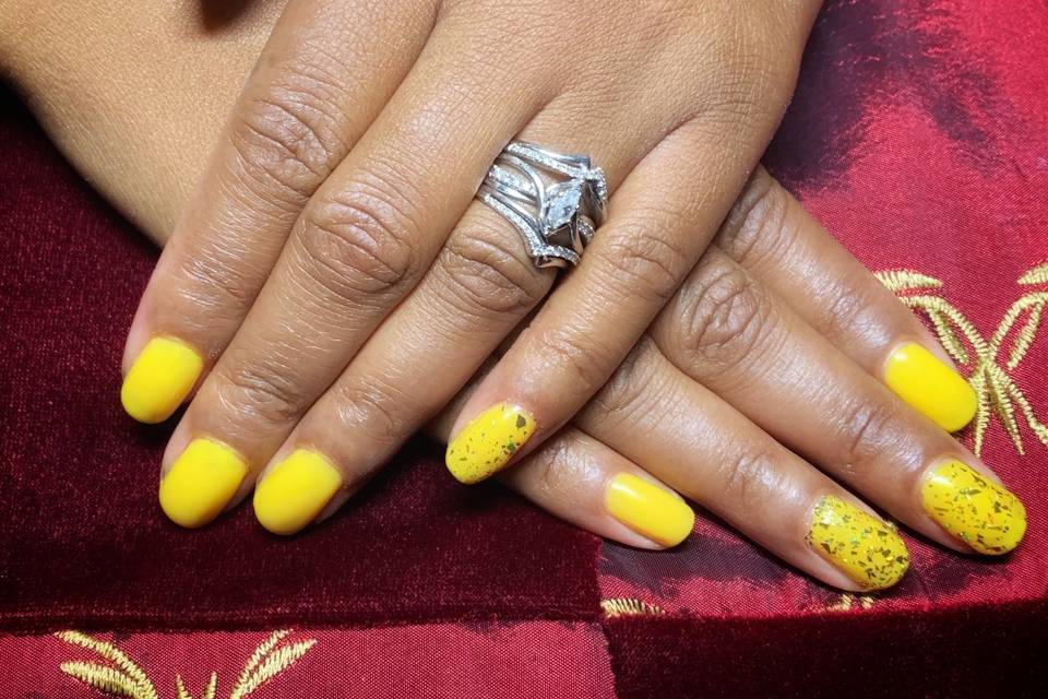 Yellow nails with gold foil