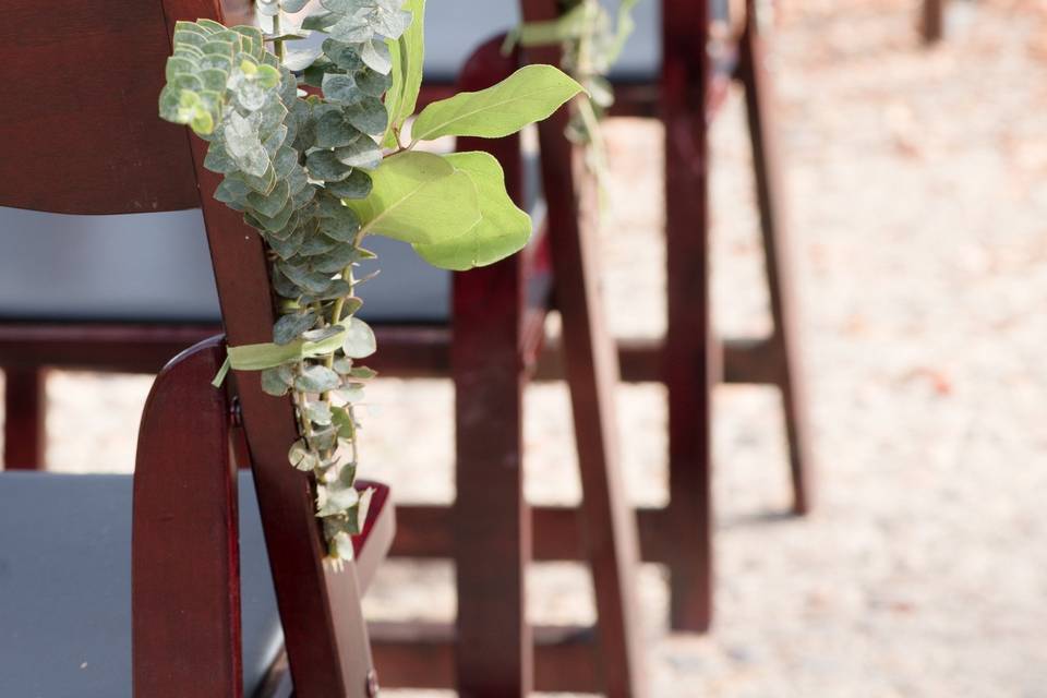 Greenery on aisle seats