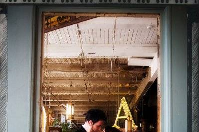 Wedding portrait in an architectural salvage warehouse in downtown Denver, Colorado. Very vintage!