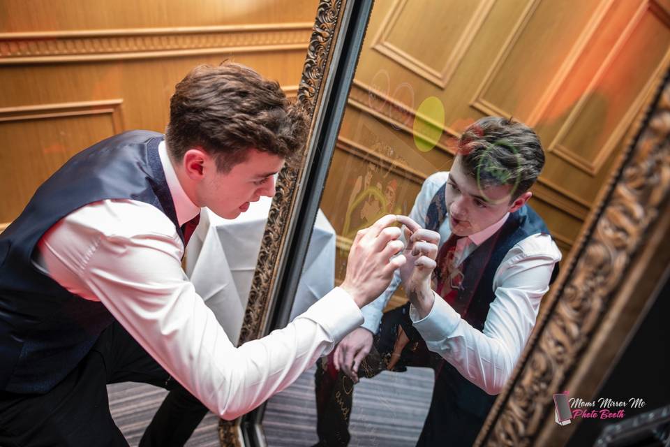 Groom with mirror