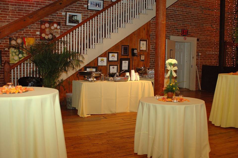 Beautiful staircase leading up to the second-floor art gallery