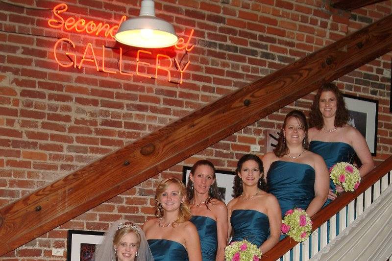 Bride and bridesmaids on the 52-step staircase