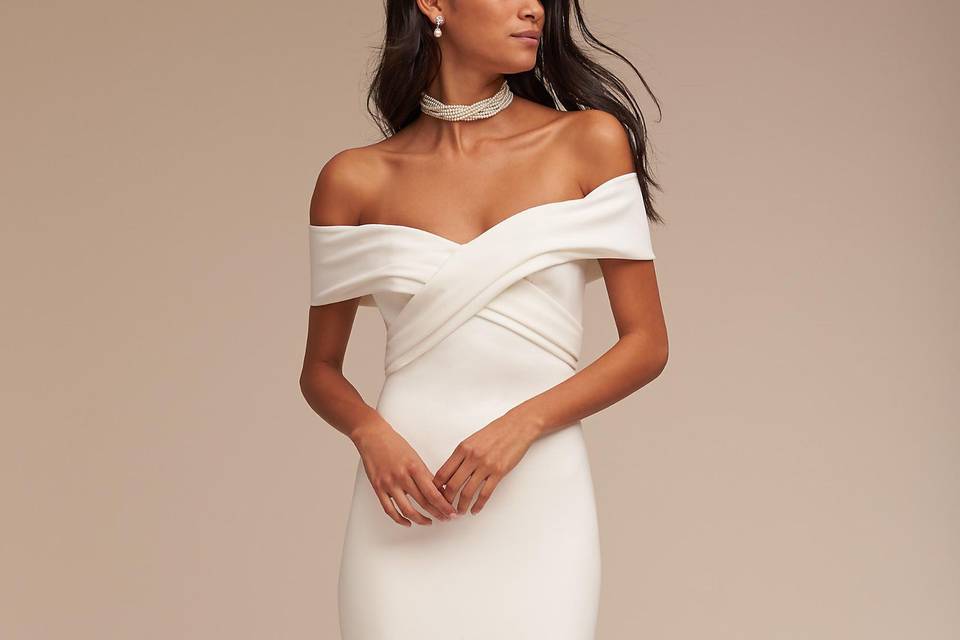 BHLDN Blake Gown		An off-the-shoulder sweetheart neckline gives this stunning ivory crepe gown an elegant, feminine air. Details like the criss-crossed bodice and sweeping train make it unforgettable.