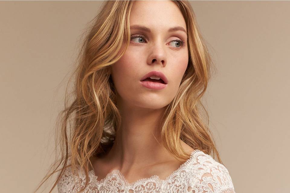 BHLDN Capri Top		Dazzle in this lace top, worn over a skirt or as a cover up to a sleek gown. We've fallen for the scalloped detailing at the bateau neckline and picture-perfect row of back buttons. We love how it perfectly transforms the Leigh Gown into a lace-sleeved beauty.