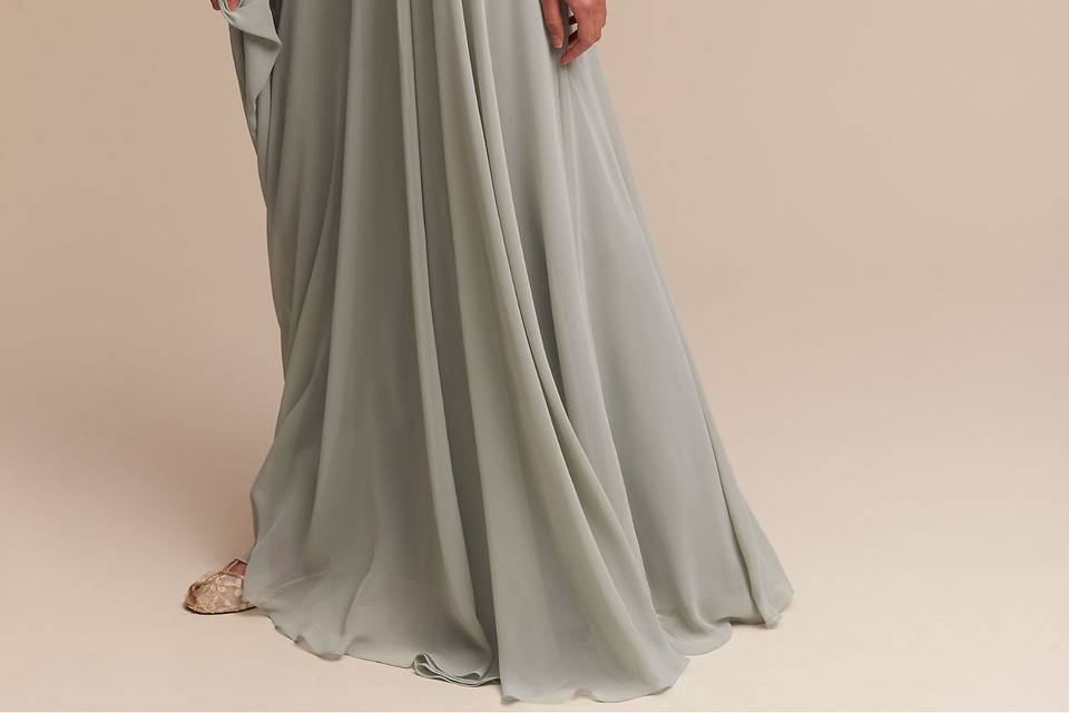 twobirds Bridesmaids	BHLDN Charlie Dress	<br>	Clean lines and an airy silhouette give this romantic maxi a modern edge. You can wear it with a high neck and front peekaboo keyhole or tie the straps in back for a halter look. A detachable belt defines the waist.