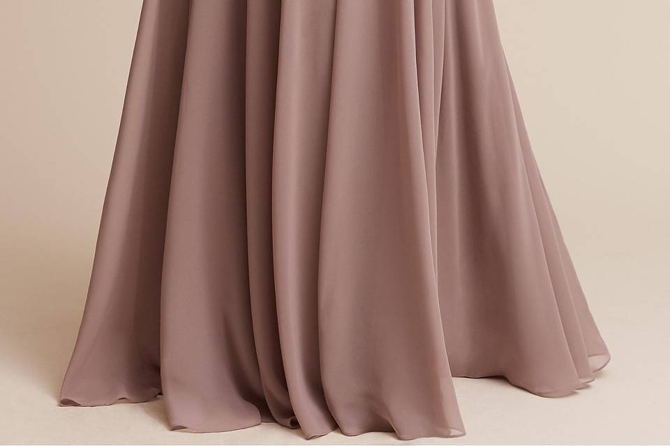 Alana Dress		Looking for something a bit different for your ladies? Look no further than this elegant chiffon dress. Dipped in the prettiest hues, the high neck and long, sweeping skirt lend loads of romance and femininity to this look.