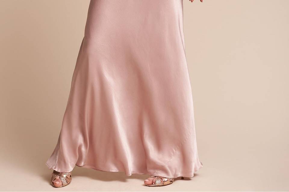 Watters	BHLDN Carnegie Dress	<br>	Chic and understated, this airy dress features a plunging back accented by a long, flowing bow. A sleeveless neckline and waist-defining crisscross detail flatter.