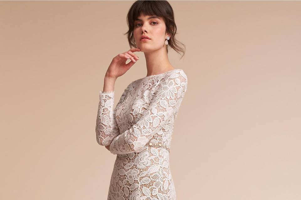 Tadashi Shoji	BHLDN Medallion Gown	<br>	Cut from bold, floral lace, this gown balances a high neck and long sleeves with a plunging back and curve-skimming column silhouette. The effect? A look that’s at once boho and super chic.