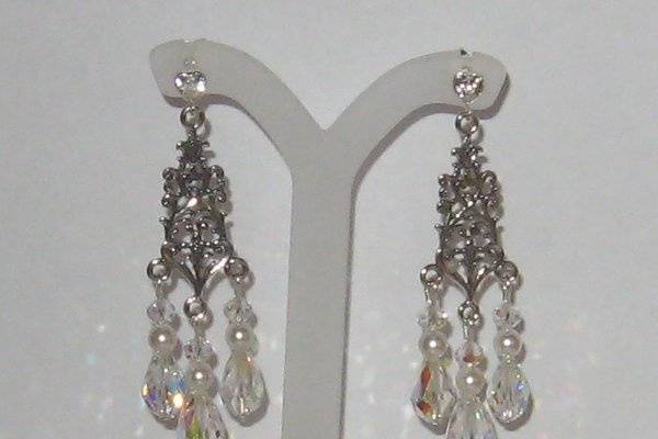 Antique Sterling Silver chandeliers.  With Clear Swarovski crystal.