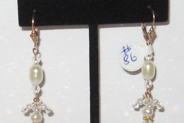 The perfect wedding earring. Fresh water Pearls and clear Swarovski crystal. Gold filled with lever backs.