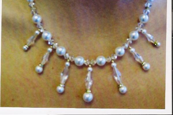 Swarovski crystal and Pearls in the white shade. This set has sold, but can be recreated.
