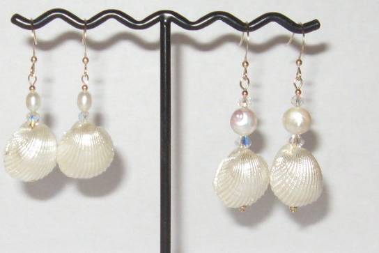 Natural shells painted with a irridescent coating and Fresh water Pearls.