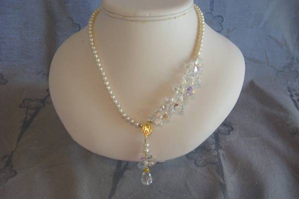 Swarovski crystal and fresh water pearls.  Same necklace in the next photo.  This necklace was designed to be worn two ways.