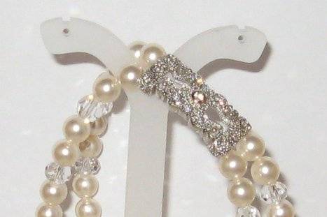 Swarovski cream pearls, and crystal. 8 1/2 inch.