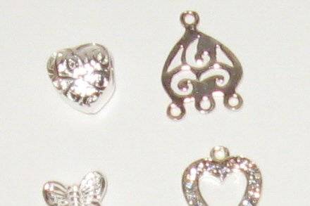 Sterling silver hearts and butterflies.
