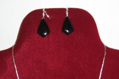 Onyx and sterling silver hand formed triangle drops and tubes.  This is a one and only set.