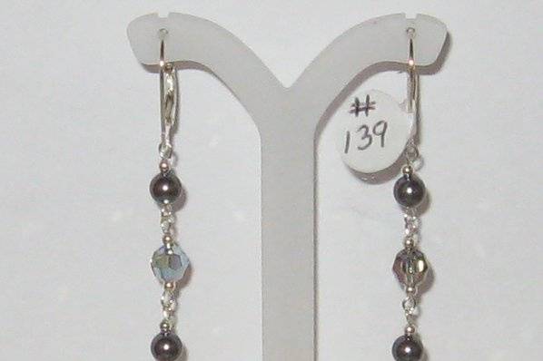 The Kristen Earrings in black diamond SWAROVSKI crystal and dark grey pearl also SWAROVSKI.  Sterling silver earrings.  This is not a one only and would make a great after the wedding earring.  It can be made longer or shorter.